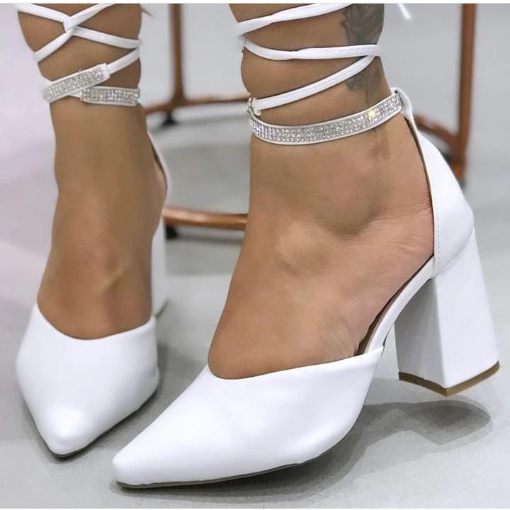 White pumps with rhinestones